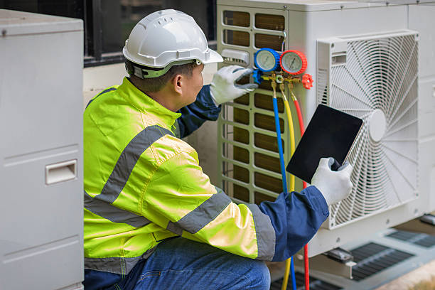 Professional Air Duct Cleaning technician working in Saint Francisville, IL